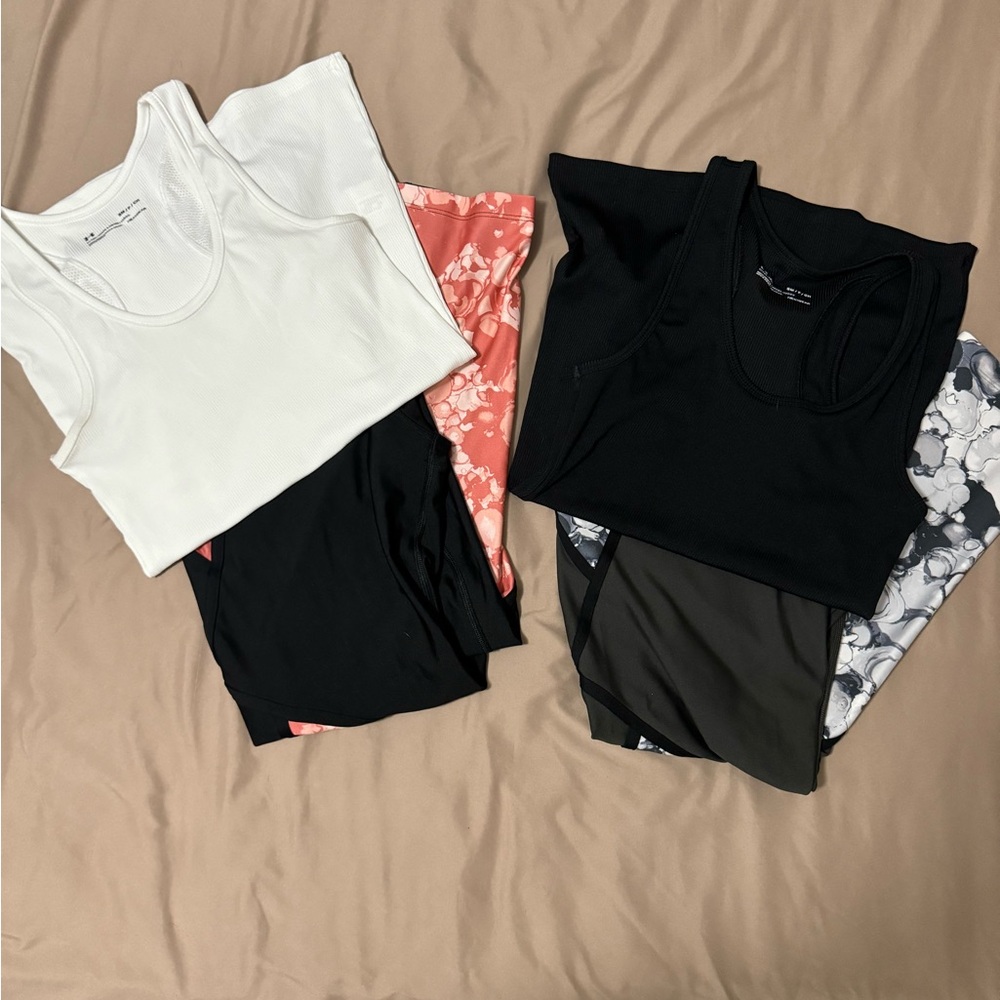 Two sets of workout shirts & pants all -brand new from UA-comes!  free UA HOODIE